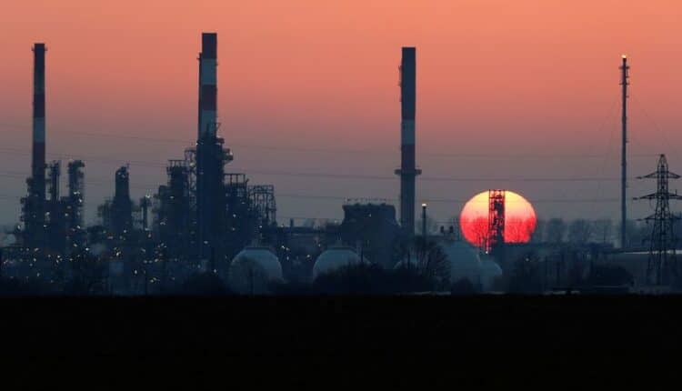 Oil prices rise on economic outlook, drawdown in fuel stocks