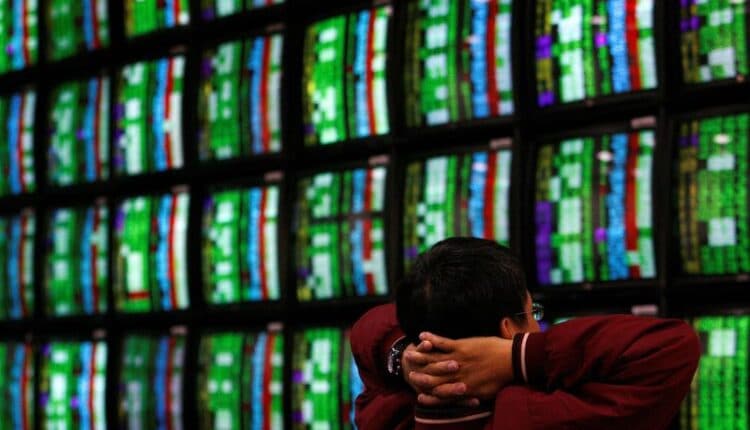 Asian shares mixed as investors digest U.S. inflation surge