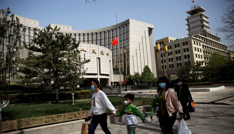 China leaves lending benchmarks unchanged amid global rates squeeze