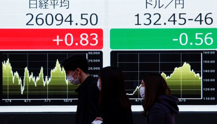 Asian markets lifted by tech rally, Japan pressured by BOJ rate hike fears